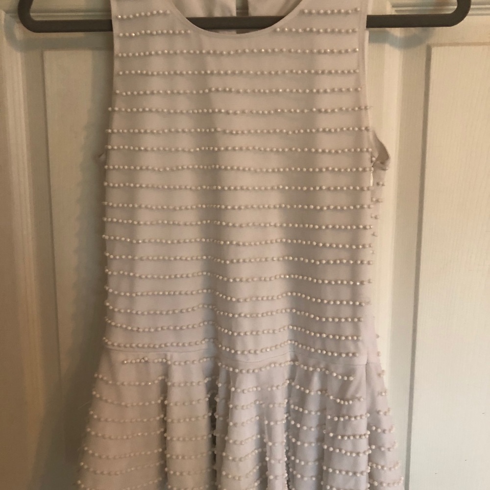 White peplum top